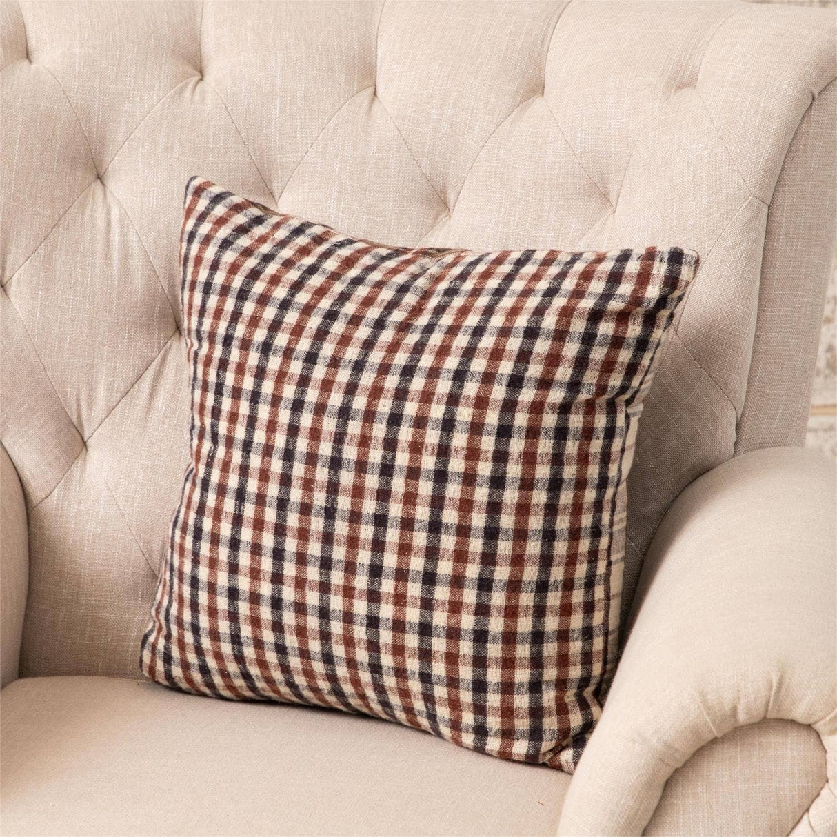 Close-up of brown plaids reversible brushed cotton pillow detail from Magnolias Home Decor
