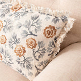 Close-up of blue & gold floral motif lumbar pillow detail from Magnolias Home Decor
