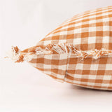 Rust and cream fall check pillow styled for Fall home decor from Magnolias Home Decor