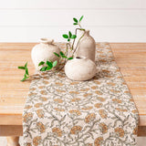 Block print dandelion table runner styled in a home decor vignette from Magnolias Home Decor