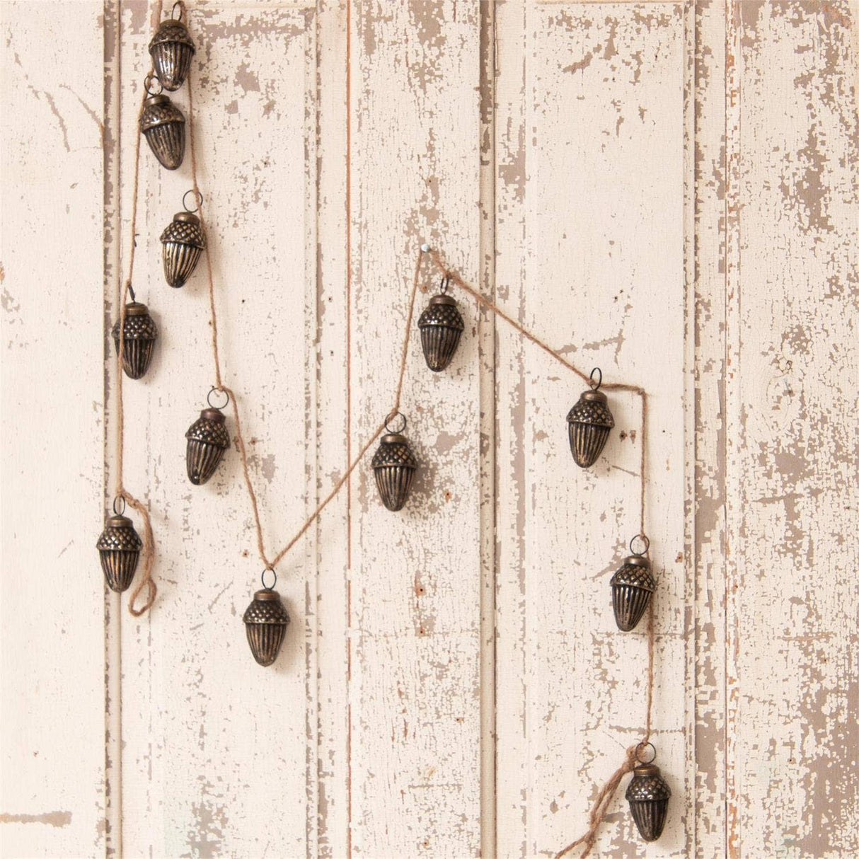 71" antiqued glass acorns garland styled for Fall home decor from Magnolias Home Decor